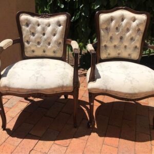 Pair of vintage carved armchairs
