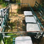 8 x wrought iron chairs with cushions - each